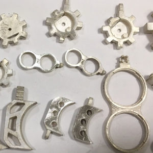 Joe Wall unpolished silver pendants